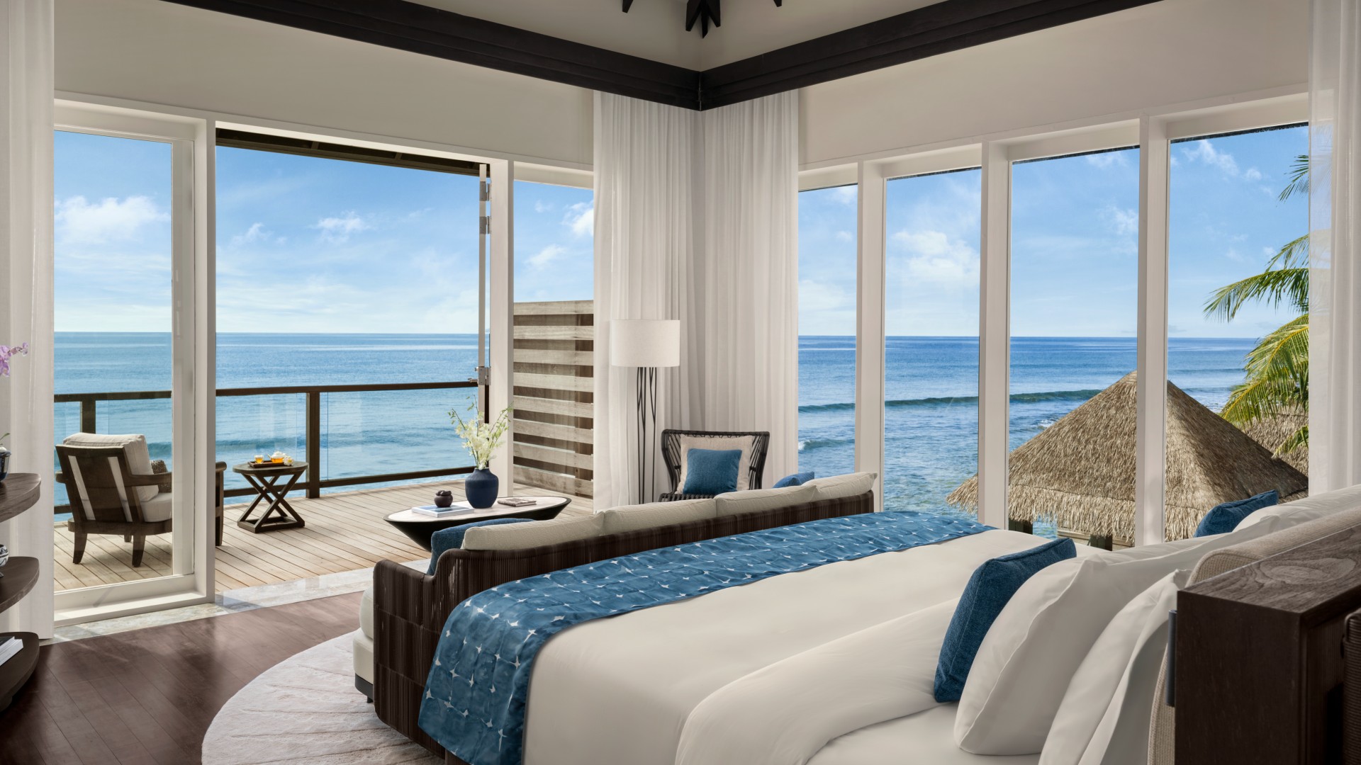 Bedroom vie with lagoon view of the Two Bedroom Beach Pool Residence at Naladhu Private Island Maldives